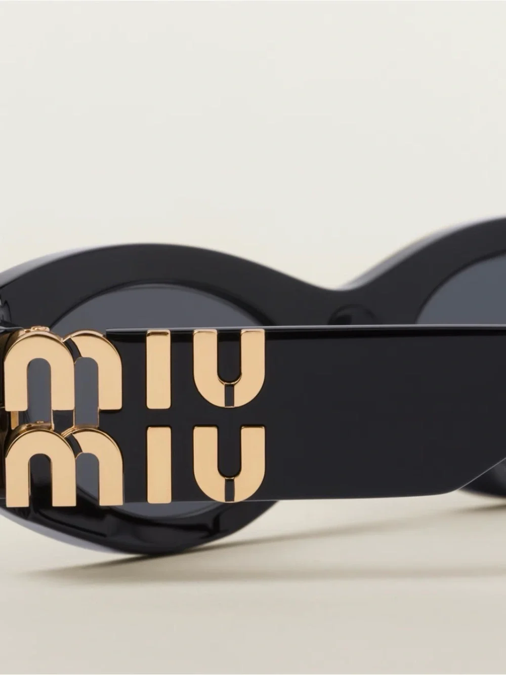 Miu Miu Kids Black Sunglasses with Gold Logo